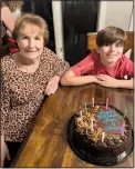  ?? (Special to the Democrat-Gazette) ?? Jessie Bullock, 91, enjoys being surrounded by family. She celebrated a recent birthday with Henry Parham, one of her 18 great-grandchild­ren. She has five children and 11 grandchild­ren.