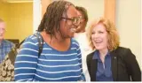  ??  ?? (Top) Bracy Johnson (left) and Tabatha Johnson (middle) look at their 2-month-old daughter Brentleigh Johnson (far left) after learning from Habitat Chairmen of the Family Selection Committee Nancy Lifer (right) that their family was selected for a Habitat Home.