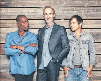  ?? [PATRICK BALLS/BMG] ?? Members of Mike + the Mechanics, from left: singer Andrew Roachford, guitarist Mike Rutherford and singer Tim Howar