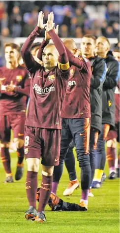  ??  ?? Barcelona players celebrate La Liga victory