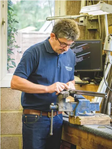  ??  ?? Alex Torok at work in the garden shed he has converted into a workroom in his yard to the west of London