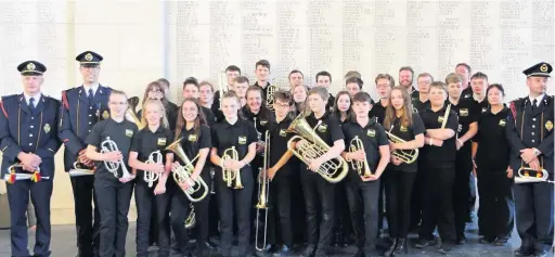  ??  ?? ●●Stockport Schools’ Brass Band (SSBB) at the Menin Gate ceremony