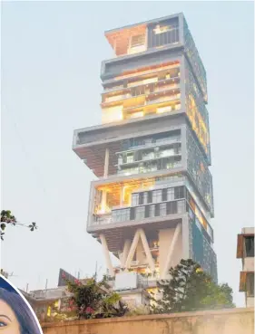  ?? Photos / Sportzpics for BCCI, Getty Images, AP ?? Mitchell McClenagha­n’s first major offshore contract was with the Mumbai Indians; McClenagha­n appeals for a wicket during last year’s clash between the Mumbai Indians and Kings XI Punjab (top); the Ambanis’ mansion in Mumbai (above); Mumbai Indians team owners Akash and Nita Ambani (left).