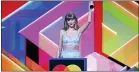  ??  ?? Taylor Swift accepts the Global Icon award