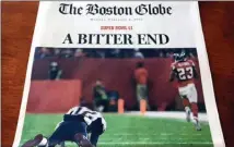  ?? The Associated Press ?? A front page of an early edition of The Boston Globe in North Fort Myers, Fla., shows the headline, A Bitter End over an image of fallen New England Patriots quarterbac­k Tom Brady, suggesting the Patriots lost to the Atlanta Falcons in Super Bowl 51.