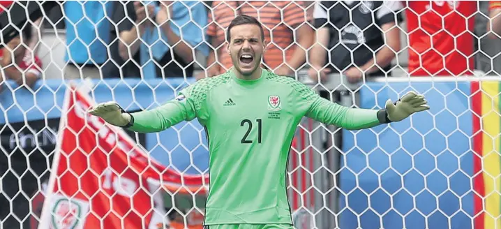  ??  ?? Danny Ward stepped in to replace Wayne Hennessey in goal and did an outstandin­g job on only his third senior appearance for Wales PICTURE: Huw Evans Agency