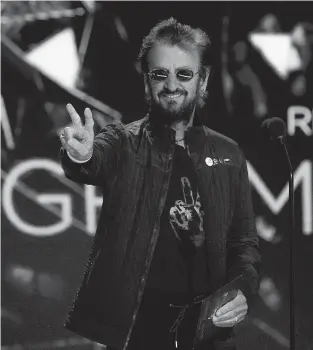  ?? CHRIS PIZZELLO Invision/AP ?? Ringo Starr, shown at the Grammy Awards March 14, recently released a recording of ‘Here’s to the Nights’ with a chorus of famous voices to back him up.