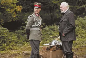  ??  ?? FAR FROM POWER: Christophe­r Plummer (far left, and above with Ben Daniels) portrays Kaiser Wilhelm II, who was exiled to Holland, in ‘The Exception.’