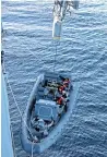  ?? US NAVY ?? Sailors are lifted back on board the Norfolk-based transport dock ship USS San Antonio after an exercise on this rigid-hull Wednesday on the Atlantic Ocean, off the southern coast of Ireland during boat operations.