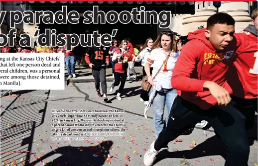  ?? PHOTO BY ANDREW CABALLERO-REYNOLDS/AFP ?? People flee after shots were fired near the Kansas City Chiefs’ Super Bowl 58 victory parade on Feb. 14, 2024, in Kansas City, Missouri. A shooting incident at a packed parade Wednesday to celebrate the Chiefs’ victory killed one person and injured nine others, the city fire department said.