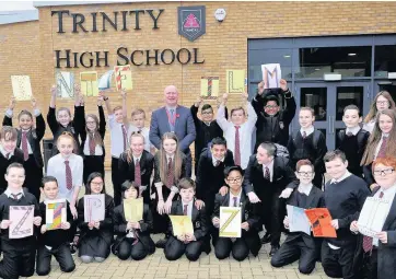  ??  ?? Movie stars Pupils at Trinity High get into the spirit of things for the Into Film Festival