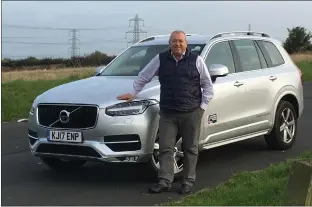  ??  ?? Clockwise from top left: Mark Porter with his trusty XC90, a colourful street in Kinsale, the Trump golf course floral tribute and the freshest fish dining in Out of the Blue