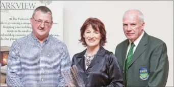  ??  ?? Keith Earls and Michael Conlon present Ann Randolph on behalf of her son Darren Randolph of West Ham United with the Sports Person of the Year Award at the Wicklow and District League Awards in the Parkview Hotel, Newtown.