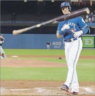  ?? CP PHOTO ?? Toronto Blue Jays’ Troy Tulowitzki throws his bat after making the final out in Game 5 of baseball’s American League Championsh­ip Series against the Cleveland Indians in Toronto on Wednesday.