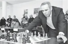  ??  ?? File photo shows Kasparov playing simultaneo­us chess games in Tbilisi, during his visit to Georgia. — AFP photo