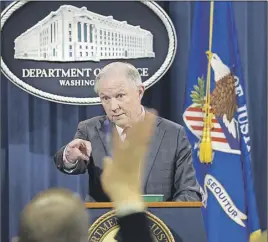  ?? AP PHOTO ?? U.S. Attorney General Jeff Sessions calls on a reporter during a news conference at the Justice Department in Washington.