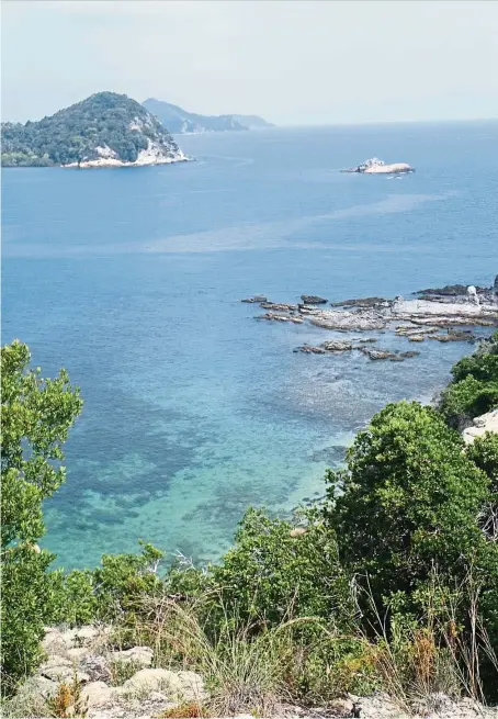  ??  ?? The hill at Pulau Sibu Kukus offers a glorious view of the surroundin­g seas. — Photos: ANDREW SIA/The Star