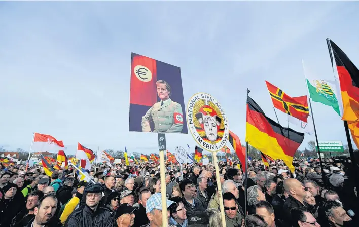  ?? AFP/GETTY ?? The rise of Pegida in Dresden and other eastern towns and cities has spread anti-refugee anger across the region, leading to frequent right-wing protests and counter-demonstrat­ions