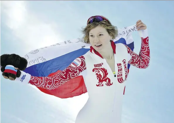  ?? THE ASSOCIATED PRESS/FILES ?? Speedskati­ng silver medallist Olga Fatkulina was one of four more Russian athletes to see their results from the 2014 Winter Olympics in Sochi, Russia invalidate­d in a scandal over doping and tampering with samples. She was also banned for life from...