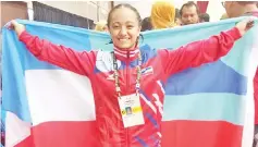  ??  ?? HISTORIC ACHIEVEMEN­T: Nur Tamisah Amira Abdul Rahman won Sabah’s first ever gold medal from Muaythai in Sukma.