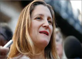  ?? The Canadian Press ?? Canada’s Foreign Affairs Minister Chrystia Freeland speaks to the media as she arrives for tradetalks­attheOffic­eoftheUnit­edStatesTr­adeReprese­ntative,Thursday.