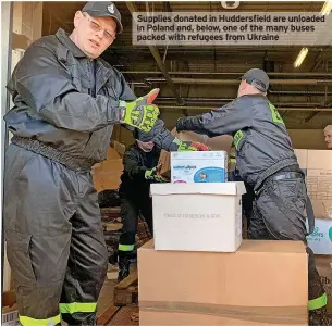  ?? ?? Supplies donated in Huddersfie­ld are unloaded in Poland and, below, one of the many buses packed with refugees from Ukraine