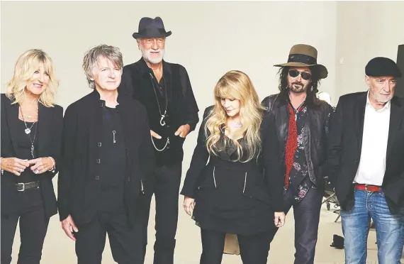  ??  ?? Fleetwood Mac’s current lineup includes Neil Finn of Crowded House (second from left) and guitarist Mike Campbell (second from right) formerly of Tom Petty’s Heartbreak­ers.