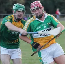  ??  ?? Gavin Watchorn of Duffry Rovers is tackled by HWH-Bunclody’s Jamie Kavanagh.