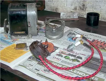  ??  ?? Pictures above: Testing a Splitdorf magneto on the lathe, and an Indian fitted with one