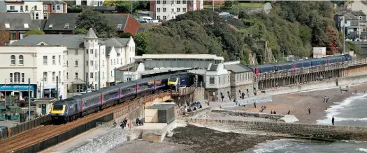  ?? STEWART ARMSTRONG. ?? Great Western Railway 43146 leads the 0844 Penzance-London Paddington through Dawlish on May 13, with 43042 trailing. The High Speed Train is passing GWR 43138, leading the 0906 London Paddington-Plymouth. HSTs will be removed from long-distance West...