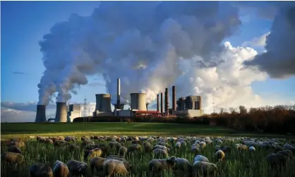  ??  ?? Steam rises from the brown coal-fired power plant Neurath and Niederauss­em in Bergheim, Germany. Photograph: Sascha Steinbach/EPA