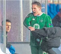  ??  ?? John Collins looks stunned as Kris Commons launches into a tirade after being taken off against Molde in October, 2015