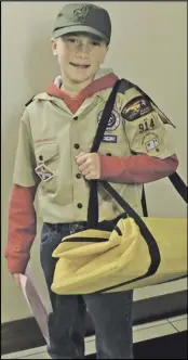  ?? ?? Scout Nolan Wachauff helped carry
ballots into the Board of Elections office Tuesday evening.