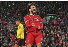  ?? FOTO: DEVLIN/DPA ?? Mo in Jubelpose: Beim 5:0-Erfolg am Samstag gegen den FC Watford erzielte der Ägypter Mohamed Salah vier Tore und bereitete eins vor.