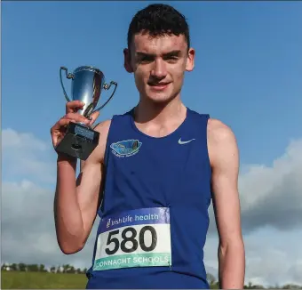  ??  ?? Kealon Kilrehill, from Colaiste Iascaigh who won the Intermedia­te Boys 4500m race during the Irish Life Health Connacht Schools Cross Country at Calry Community Park. David Maher/ Sportsfile