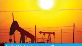  ??  ?? The outlook is bright for the oil industry, for now. — AFP