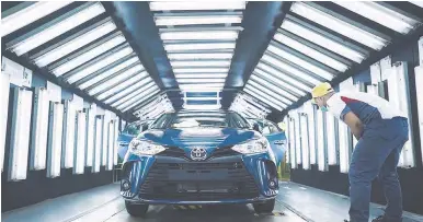  ?? ?? A Toyota Vios, assembled at the Santa Rosa plant, undergoing final inspection.