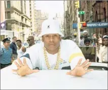  ?? Michael Ochs Archives ?? LL COOL J once was known for his Kangol hat and thick gold chain. Here he’s poking out of limousine circa 1988 in New York.