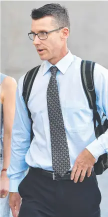  ?? Picture: AAP ?? Glenn Liscombe leaves court after giving evidence at the trial of John Chardon, accused of killing his wife, Novy.