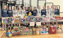  ?? CONTRIBUTE­D ?? The NNEC Gryphons, with toys collected during their annual December tournament. From left, Emily MacNeil, Jade Butler, Kassi Brightman, Sarah Fast, Isabella MacKay, Emily Arbuckle, Alexandra Morrison, Kaitlyn Jota, Jaden MacEachern, Maddie MacMillan, Taylor Hazzard, Mattea Miller and Ashley Arbuckle.