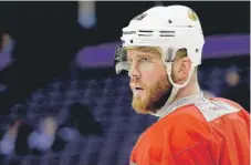  ?? | AP ?? Bryan Bickell was back with the Blackhawks after clearing waivers. “I’m just taking it as an awakening ... [a chance] to set a fire,” he said.