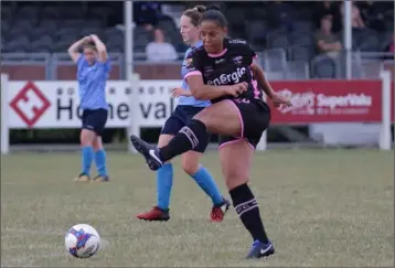  ??  ?? Rianna Jarrett scoring one of her two goals.