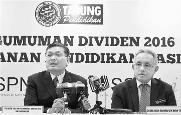  ??  ?? Shamsul and Wan Ahmad during the press conference after announcing the four per cent dividend for the education savings scheme SSPN-i and SSPN-i Plus for 2016. — Bernama photo