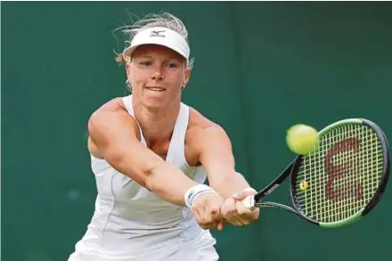  ?? EPA PIC ?? Kiki Bertens continues her giant-killing run at Wimbledon after beating seventh seed Karolina Pliskova yesterday.