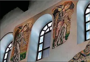  ??  ?? Ce qui reste des mosaïques de la basilique de la Nativité a été restauré.