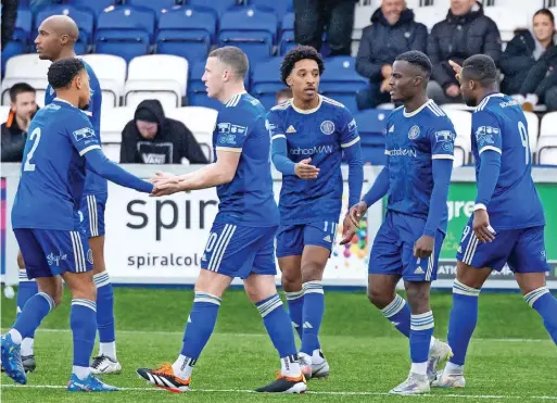  ?? Published by MEN Media, Mitchell Henry House, Hollinwood Avenue, Chadderton, OL9 8EF. Printed by Reach Printing Services (Oldham) Limited, Hollinwood Avenue, Chadderton, Oldham OL9 8EB ?? ●●Silkmen players celebrate John Rooney’s goal against Marine at the weekend whch made it 2-0 to thPehilhJo­nmese/sspiodrets­eyephoto.com