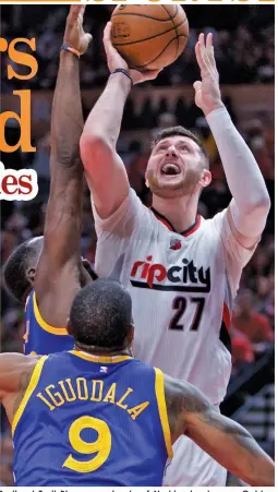  ?? ASSOCIATED PRESS ?? Portland Trail Blazers center Jusuf Nurkic shoots over Golden State Warriors forward Draymond Green, left, and forward Andre Iguodala, center, during the second half of Game 3 of an NBA basketball first-round playoff series in Portland, Oregon. The...