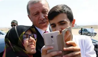  ?? KAYHAN OZER PRESIDENTI­AL PRESS SERVICE VIA THE ASSOCIATED PRESS ?? Turkish President Recep Tayyip Erdogan’s government crackdown has created tensions with key western allies.