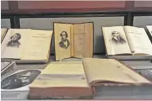  ??  ?? A collection of early editions of novels written by British author Charles Dickens at the Charles Dickens Museum. — AFP photos