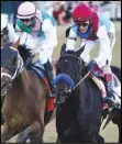  ?? Associated Press ?? BIG WIN — John Velazquez riding Medina Spirit leads Florent Geroux on Mandaloun and Flavien Prat riding Hot Rod Charlie to win the 147th running of the Kentucky Derby at Churchill Downs on Saturday in Louisville, Ky.